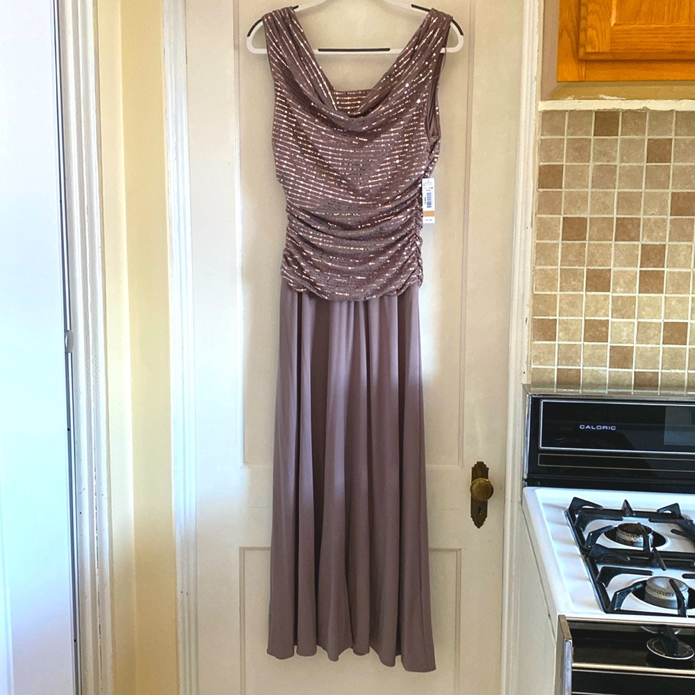 Dress never worn. Color Mocha, V shape in back and sloped in front.
